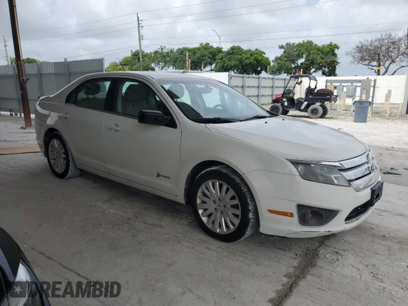 2012 Ford Fusion Hybrid with VIN 3FADP0L35CR173817, listed as a Copart auction lot 62750055 with 145,655 mi miles and Clean title. Bid and sale history available at DreamBid. Image 4.
