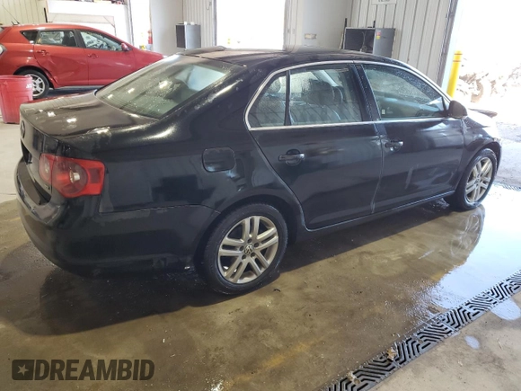 2005 Volkswagen Jetta with VIN 3VWST71KX5M634698, listed as a Copart auction lot 74568524 with 352,048 mi miles and Salvage title. Bid and sale history available at DreamBid. Image 3.