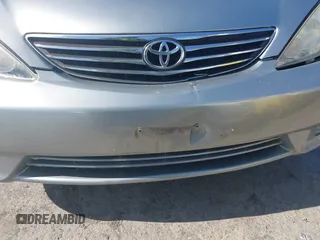 2005 Toyota Camry LE z VIN 4T1BE30K65U592500, wystawiony jako IAAI lot #42373718 z przebiegiem 189 054 mil mil oraz . Historia ofert i sprzedaży dostępna na DreamBid. Obrazek 18.
