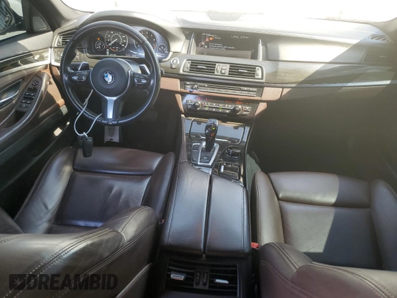 2016 BMW 5 Series 550i with VIN WBAKN9C59GD963159, listed as a Copart auction lot 50718175 with 113,715 mi miles and Salvage title. Bid and sale history available at DreamBid. Image 8.