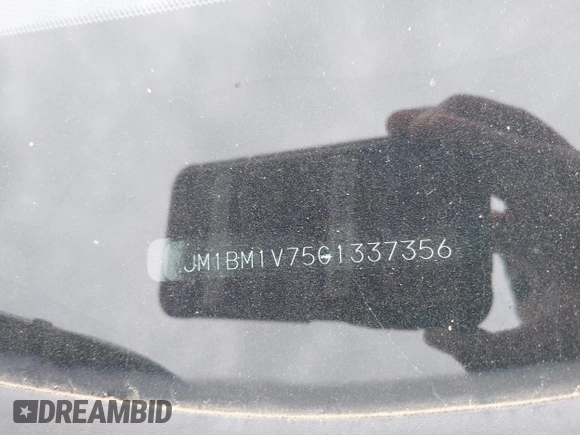 2016 Mazda 3 i Touring with VIN JM1BM1V75G1337356, listed as a IAAI auction lot 42123941 with 90,820 mi miles and . Bid and sale history available at DreamBid. Image 9.
