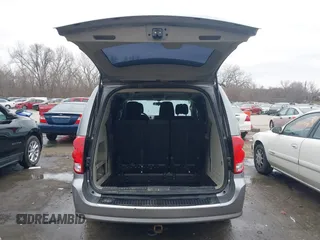 2014 Dodge Grand Caravan American Value with VIN 2C4RDGBG9ER187198, listed as a IAAI auction lot 41669334 with 204,803 mi miles and . Bid and sale history available at DreamBid. Image 18.