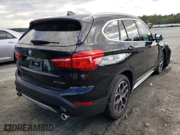 2022 BMW X1 xDrive28i with VIN WBXJG9C09N5V48303, listed as a Copart auction lot 60215072 with 1,643 mi miles. Bid and sale history available at carsss.com. Image 4.