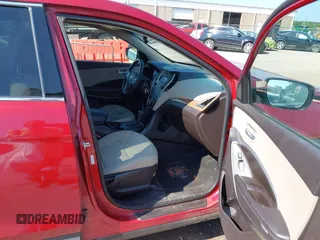 2014 Hyundai Santa Fe with VIN 5XYZT3LB1EG134837, listed as a IAAI auction lot 42454126 with 118,225 mi miles and . Bid and sale history available at DreamBid. Image 5.