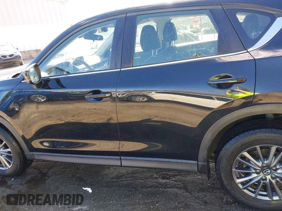 2017 Mazda CX-5 Sport with VIN JM3KFABL5H0141895, listed as a IAAI auction lot 41718108 with 69,312 mi miles. Bid and sale history available at carsss.com. Image 14.