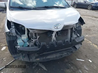 2011 Toyota Sienna XLE AAS with VIN 5TDYK3DC8BS157794, listed as a IAAI auction lot 40759823 with 211,716 mi miles and . Bid and sale history available at DreamBid. Image 12.