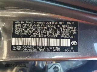 2012 Toyota Yaris L z VIN JTDKTUD35CD505783, wystawiony jako Copart lot #42017425 z przebiegiem 182 875 mil mil oraz Szkoda całkowita • Salvage title. Historia ofert i sprzedaży dostępna na DreamBid. Obrazek 12.