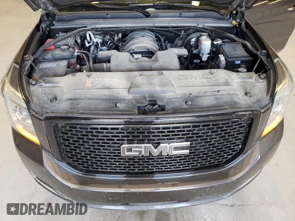 2019 GMC Yukon SLT with VIN 1GKS2BKC8KR163973, listed as a Copart auction lot 59042214 with 119,269 mi miles and Salvage Title. Bid and sale history available at carsss.com. Image 12.