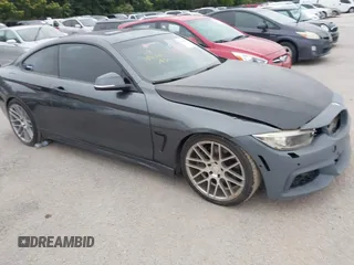 2014 BMW 4 Series 435i xDrive z VIN WBA3R5C53EK188805, wystawiony jako IAAI lot #42365884 z przebiegiem 148 294 mil mil oraz . Historia ofert i sprzedaży dostępna na DreamBid. Obrazek 1.
