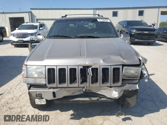 1998 Jeep Grand Cherokee Limited with VIN 1J4GZ78S5WC325148, listed as a Copart auction lot 67780424 with Not provided miles and Salvage title. Bid and sale history available at DreamBid. Image 5.