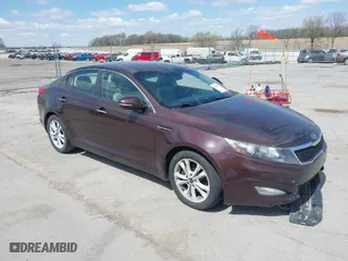 2011 Kia Optima EX with VIN KNAGN4A7XB5055304, listed as a IAAI auction lot 42023759 with 158,385 mi miles. Bid and sale history available at carsss.com. Image 1.