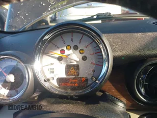 2011 MINI Convertible with VIN WMWZN3C55BT133367, listed as a IAAI auction lot 41781374 with 124,036 mi miles and . Bid and sale history available at DreamBid. Image 7.