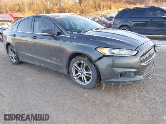 2015 Ford Fusion SE Hybrid with VIN 3FA6P0LU1FR219908, listed as a IAAI auction lot 41272688 with 310,452 mi miles. Bid and sale history available at carsss.com. Image 1.