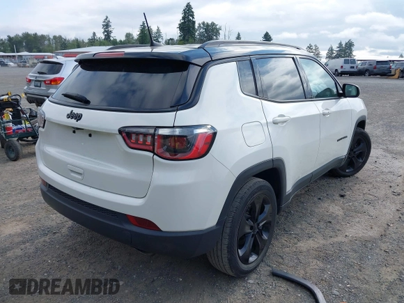 2019 Jeep Compass Latitude with VIN 3C4NJCBB0KT677025, listed as a IAAI auction lot 42574952 with 53,681 mi miles and . Bid and sale history available at DreamBid. Image 4.