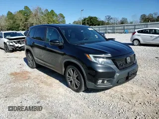 2019 Honda Passport EX-L with VIN 5FNYF7H58KB004635, listed as a Copart auction lot 87083684 with 61,022 mi miles and Salvage Title. Bid and sale history available at carsss.com. Image 12.