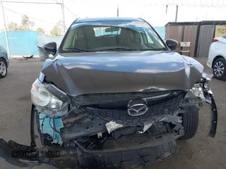 2014 Mazda CX-5 Touring with VIN JM3KE2CY9E0384401, listed as a IAAI auction lot 41699913 with 75,301 mi miles. Bid and sale history available at carsss.com. Image 12.