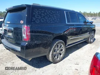 2016 GMC Yukon XL Denali with VIN 1GKS1HKJ5GR435925, listed as a IAAI auction lot 41727259 with 137,098 mi miles. Bid and sale history available at carsss.com. Image 4.