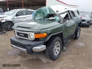 2014 Toyota FJ Cruiser with VIN JTEBU4BF4EK189989, listed as a IAAI auction lot 41600903 with 1 mi miles. Bid and sale history available at carsss.com. Image 2.