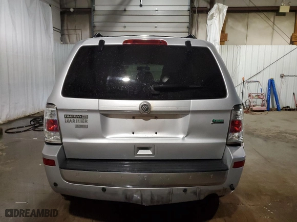 2011 Mercury Mariner Premier with VIN 4M2CN8HG0BKJ05427, listed as a Copart auction lot 73023044 with 132,452 mi miles and Salvage Title. Bid and sale history available at carsss.com. Image 6.