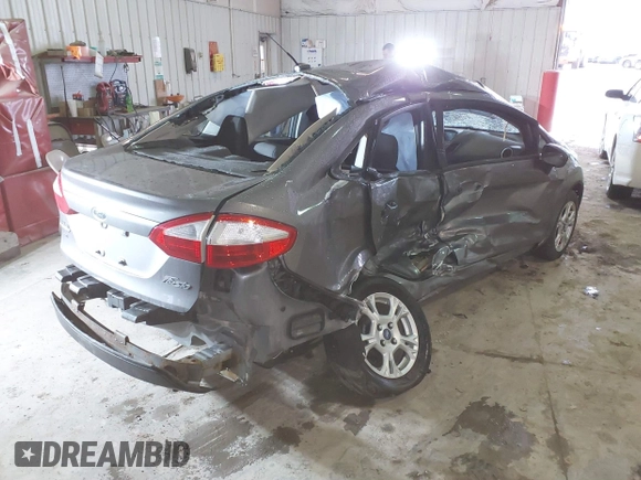 2014 Ford Fiesta SE with VIN 3FADP4BJ9EM117175, listed as a IAAI auction lot 41737432 with 156,141 mi miles. Bid and sale history available at carsss.com. Image 4.