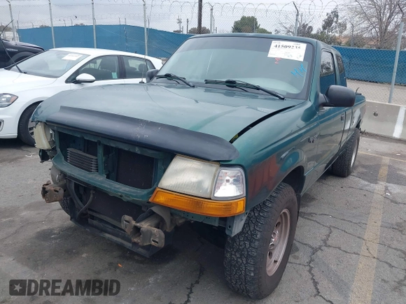 1999 Ford Ranger XLT with VIN 1FTYR14X2XPB07901, listed as a IAAI auction lot 41509235 with 115,418 mi miles. Bid and sale history available at carsss.com. Image 18.