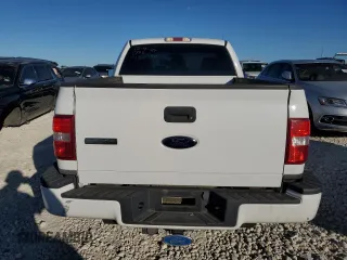 2006 Ford F-150 STX with VIN 1FTRF02W86KD93024, listed as a Copart auction lot 84327634 with 153,529 mi miles and Salvage Title. Bid and sale history available at carsss.com. Image 6.