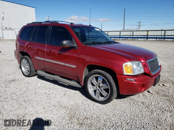 2004 GMC Envoy SLT with VIN 1GKDT13S242417226, listed as a Copart auction lot 46111865 with 375,450 mi miles and Salvage Title. Bid and sale history available at DreamBid. Image 4.