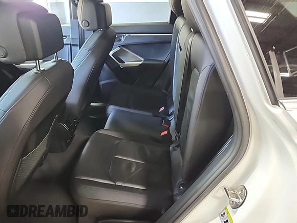 2023 Audi Q3 S line Premium с VIN WA1DECF38P1102974, выставлен на аукционе IAAI как лот 42852727 с пробегом 45 357 миль миль и . История ставок и продаж доступна на DreamBid. Изображение 2.
