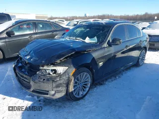 2011 BMW 3 Series 335i xDrive with VIN WBAPL5G50BNN22487, listed as a IAAI auction lot 41260533 with 123,587 mi miles and . Bid and sale history available at carsss.com. Image 2.