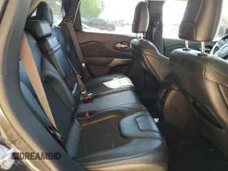 2019 Jeep Cherokee Latitude Plus z VIN 1C4PJLLN0KD151937, wystawiony jako Copart lot #53738255 z przebiegiem 63 450 mil mil oraz Szkoda całkowita • Salvage title. Historia ofert i sprzedaży dostępna na DreamBid. Obrazek 11.
