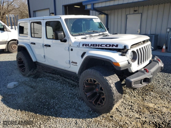 2020 Jeep Wrangler Unlimited Rubicon with VIN 1C4HJXFG7LW140402, listed as a Copart auction lot 41829145 with 49,411 mi miles and Salvage Title. Bid and sale history available at carsss.com. Image 4.