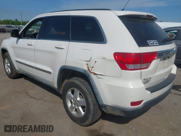 2012 Jeep Grand Cherokee Laredo with VIN 1C4RJFAG2CC176313, listed as a IAAI auction lot 42098127 with 162,556 mi miles. Bid and sale history available at carsss.com. Image 6.
