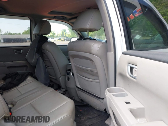 2009 Honda Pilot EX-L with VIN 5FNYF48569B040770, listed as a IAAI auction lot 42178358 with 230,826 mi miles. Bid and sale history available at carsss.com. Image 8.