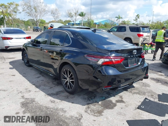 2023 Toyota Camry SE with VIN 4T1G11AK6PU741172, listed as a IAAI auction lot 41599909 with 56,668 mi miles and . Bid and sale history available at DreamBid. Image 3.