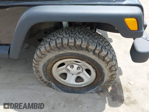 2002 Jeep Wrangler X with VIN 1J4FA39S32P738246, listed as a IAAI auction lot 42106359 with 266,993 mi miles and . Bid and sale history available at DreamBid. Image 20.