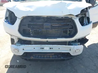 2017 Ford Transit with VIN 1FTYE1CG4HKA88456, listed as a IAAI auction lot 42043008 with 222,801 mi miles and . Bid and sale history available at DreamBid. Image 6.