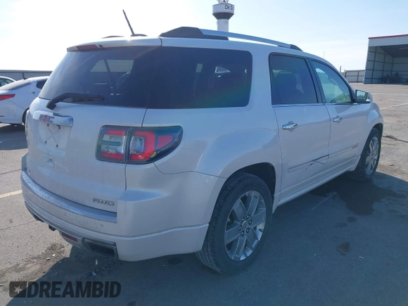 2016 GMC Acadia Denali with VIN 1GKKVTKD3GJ221449, listed as a IAAI auction lot 41777230 with 157,699 mi miles and . Bid and sale history available at DreamBid. Image 4.
