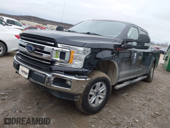2018 Ford F-150 XL with VIN 1FTEW1EB0JKD85702, listed as a IAAI auction lot 41207356 with 136,528 mi miles. Bid and sale history available at carsss.com. Image 2.