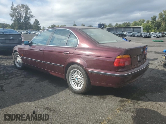 1997 BMW 5 Series 540i z VIN WBADE6320VBW54072, wystawiony jako Copart lot #74403104 z przebiegiem 98 910 mil mil oraz Czysty tytuł • Clean title. Historia ofert i sprzedaży dostępna na DreamBid. Obrazek 2.
