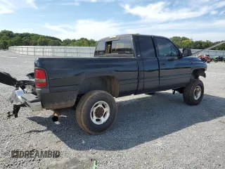 2000 Dodge Ram 2500 with VIN 3B7KF2364YG141972, listed as a Copart auction lot 70001534 with 184,140 mi miles and Salvage Title. Bid and sale history available at carsss.com. Image 3.