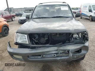 2001 Toyota Land Cruiser z VIN JTEHT05J812001099, wystawiony jako IAAI lot #42057630 z przebiegiem Nie podano mil oraz . Historia ofert i sprzedaży dostępna na DreamBid. Obrazek 11.