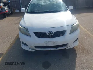 2009 Toyota Corolla with VIN 1NXBU40E09Z034408, listed as a IAAI auction lot 41797090 with 174,805 mi miles. Bid and sale history available at carsss.com. Image 6.