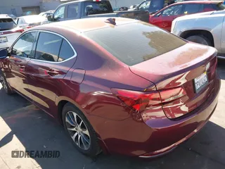 2016 Acura TLX with VIN 19UUB1F32GA000977, listed as a IAAI auction lot 41626510 with 124,916 mi miles. Bid and sale history available at carsss.com. Image 3.