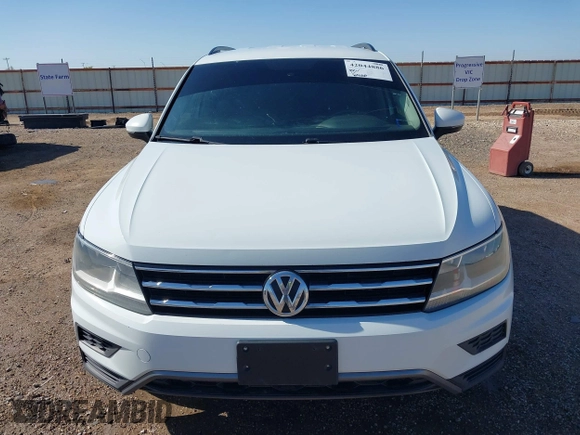 2018 Volkswagen Tiguan S with VIN 3VV0B7AX8JM076693, listed as a IAAI auction lot 42044886 with 109,660 mi miles and . Bid and sale history available at DreamBid. Image 6.