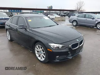 2015 BMW 3 Series 320i with VIN WBA3B1G5XFNT02032, listed as a IAAI auction lot 41581535 with 170,114 mi miles. Bid and sale history available at carsss.com. Image 1.