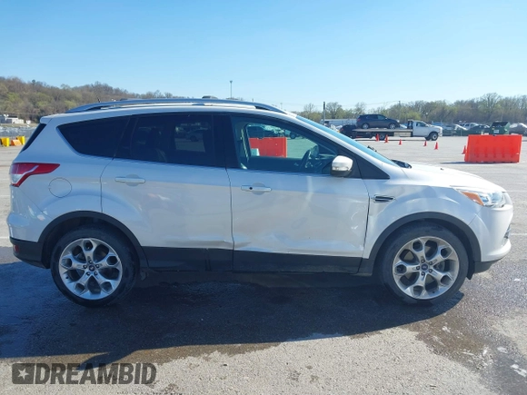 2013 Ford Escape Titanium with VIN 1FMCU0J96DUA71857, listed as a IAAI auction lot 41877003 with 118,864 mi miles and . Bid and sale history available at carsss.com. Image 13.