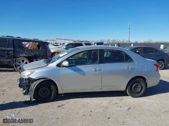 2012 Toyota Yaris with VIN JTDBT4K35CL038860, listed as a IAAI auction lot 41254384 with 161,536 mi miles. Bid and sale history available at carsss.com. Image 15.