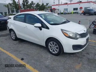 2012 Kia Rio LX with VIN KNADM4A31C6089842, listed as a IAAI auction lot 41928559 with 129,030 mi miles. Bid and sale history available at carsss.com. Image 1.