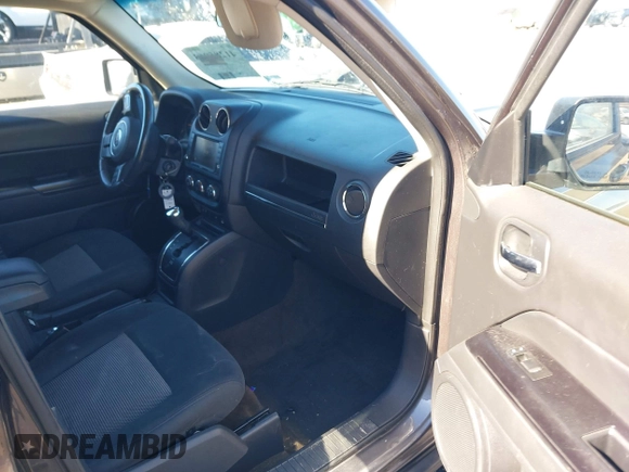 2014 Jeep Patriot Latitude with VIN 1C4NJRFB3ED886007, listed as a IAAI auction lot 41285963 with 127,007 mi miles and . Bid and sale history available at DreamBid. Image 5.
