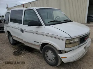 2000 GMC Safari z VIN 1GDDM19W3YB518506, wystawiony jako Copart lot #80923314 z przebiegiem 303 166 mil mil oraz Szkody całkowita. Historia ofert i sprzedaży dostępna na DreamBid. Obrazek 4.